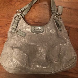 Coach lightly used shimmer silver handbag.